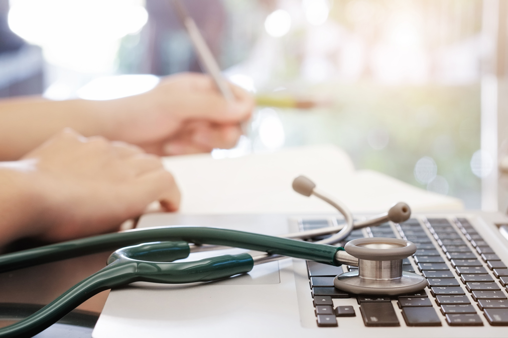 Stethoscope On Laptop And Notes